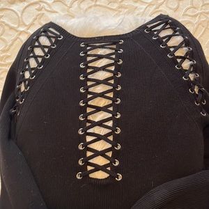 Guess knitted dress with beautiful detail at chest and waist. Holiday party